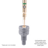 A gold Ooze pen is turned upside down and inserted into a silver armor bowl to demonstrate the vape adapter function