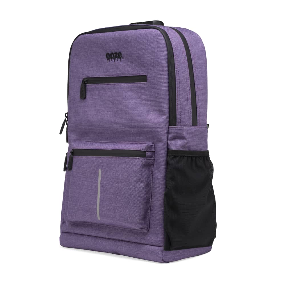 The purple haze Ooze backpack is zipped up on an angle with the water bottle side pocket showing