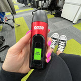 Person holding up Red Verge cannabis vape
