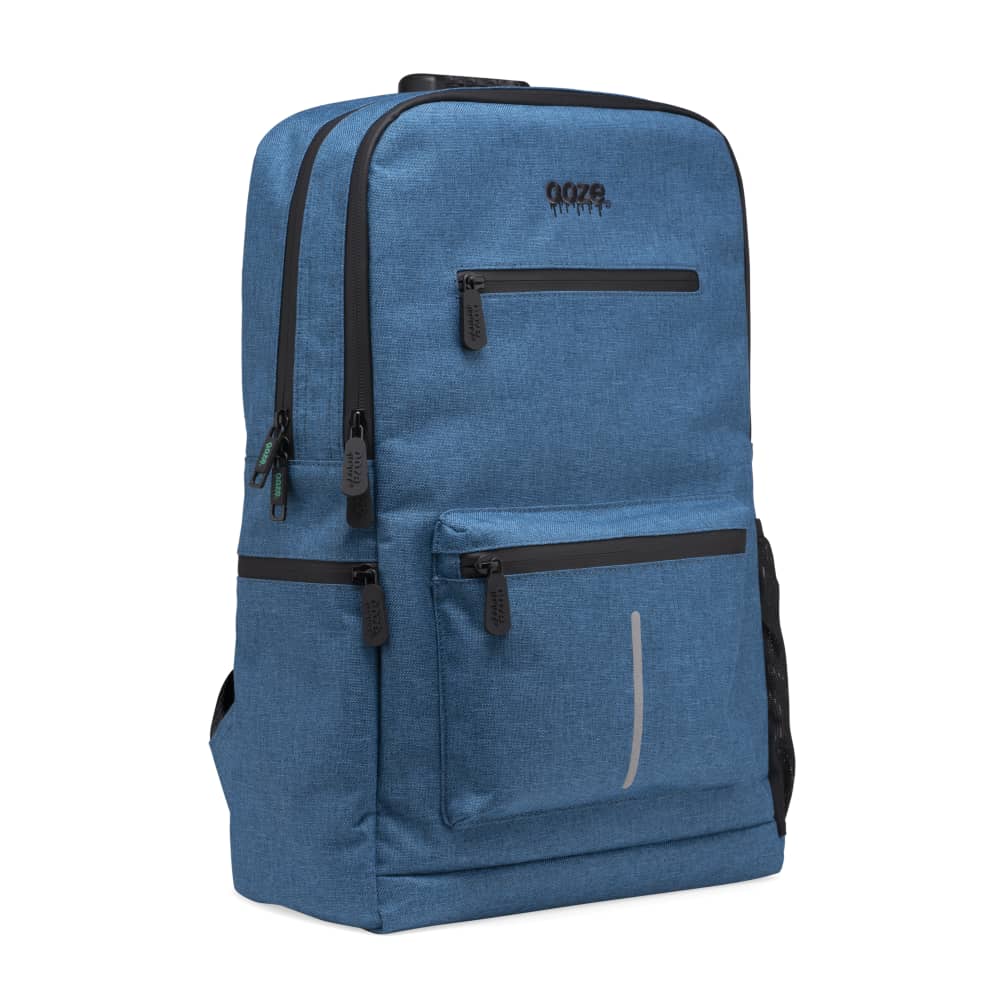 The surf blue Ooze backpack is zipped up on an angle